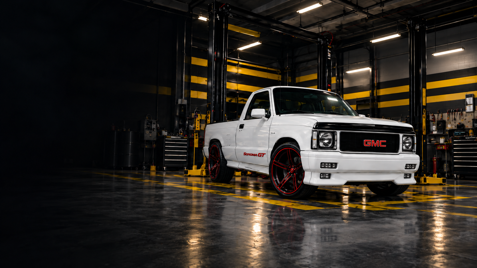 White Sonoma GT pickup truck inside Eris’s New Vision Auto Repair workshop